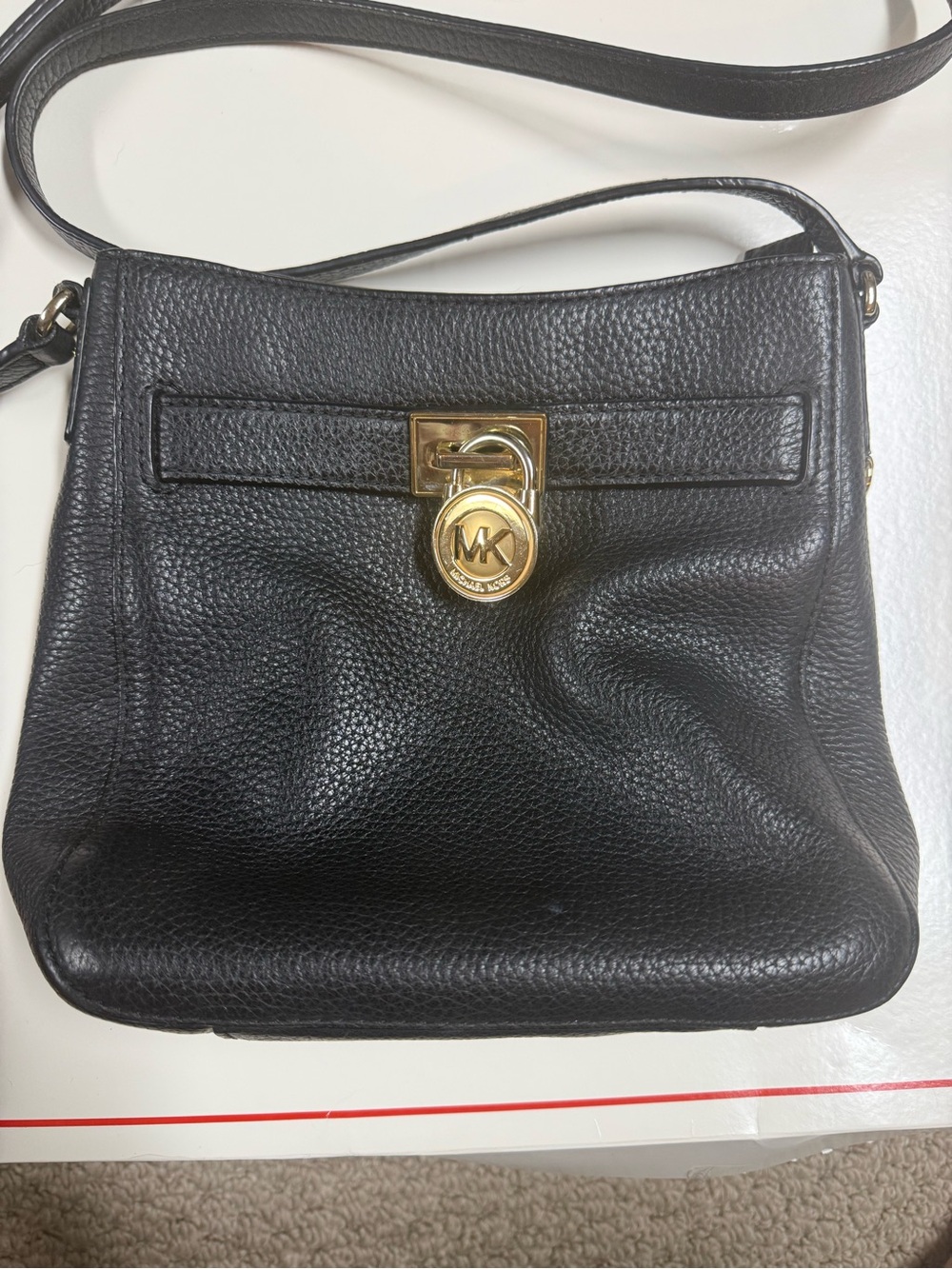Michael Kors Black Pebbled Leather Crossbody with Gold MK Charm